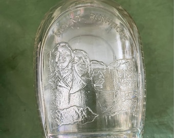 Vintage embossed Mt Rushmore clear log cabin syrup bottle with lid