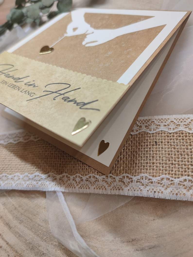 Glückwunschkarte zur Hochzeit Hand in Hand ein Leben lang Schriftzug