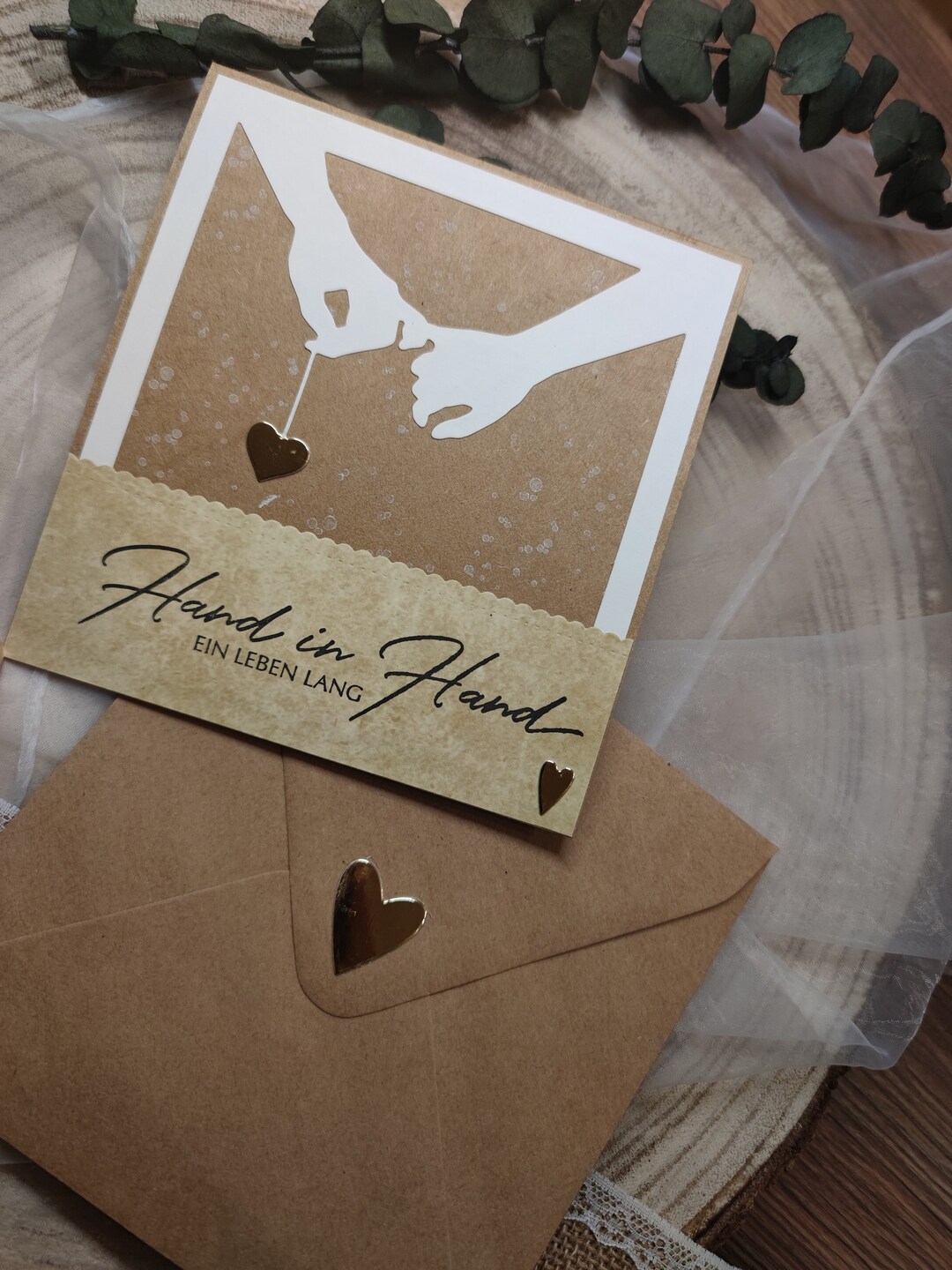 Glückwunschkarte zur Hochzeit Hand in Hand ein Leben lang Schriftzug