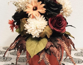 Orange pumpkin floral arrangement
