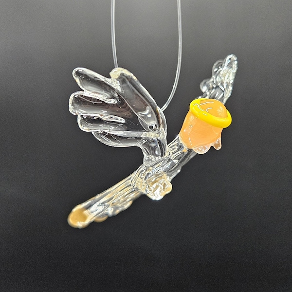 Solid sculpted clear glass angel ornament