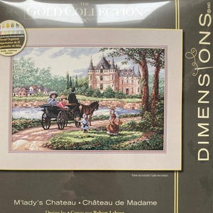 May include: A Dimensions Gold Collection counted cross stitch kit, featuring a detailed landscape scene of M'lady's Chateau. The kit includes a design by Robert Lebron, measuring 18 x 12 inches.