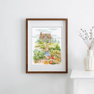 May include: A watercolor illustration of a rabbit holding a rake in front of a small stone cottage with a garden. The rabbit is wearing a blue shirt and has a basket of vegetables next to it.