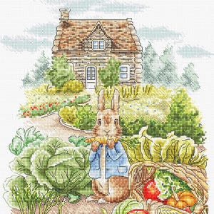 May include: A brown rabbit wearing a blue jacket holds a carrot in its mouth and stands in front of a basket full of vegetables, including tomatoes, corn, and pumpkins. A stone cottage with a brown roof is in the background.