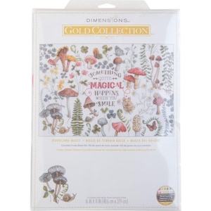 May include: Counted cross stitch kit featuring a woodland scene with mushrooms, ferns, and a quote that reads "Something quite magical happens when you smile". The kit is part of the Dimensions Gold Collection and measures 40.6 cm by 27.9 cm.