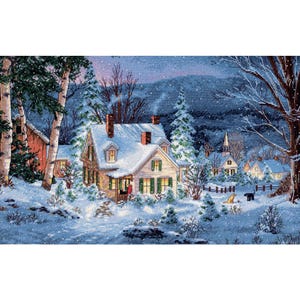 May include: A cross-stitch depiction of a snow-covered village scene. A cozy house with snow-covered roof and green shutters is the focal point. Trees and a church steeple are visible in the background, with a dog and cat in the yard.