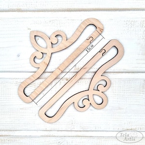 May include: Two unfinished wooden hangers shaped like a crown, measuring 15 cm in length. The hangers are designed for hanging scarves, necklaces, or other accessories.