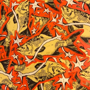May include: A collection of die-cut stickers featuring a yellow fish illustration with black line details, surrounded by white star shapes and a vibrant orange border. The fish is depicted in a swimming position with visible scales and fins.
