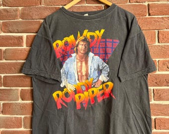 Figura de lucha libre Rowdy Piper de la WWF de los años 90, talla XL, color negro, de 1991