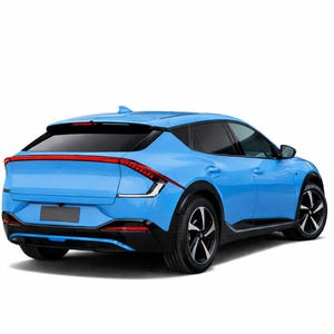 May include: A bright blue electric crossover vehicle viewed from the rear three-quarter angle. It features a continuous red LED taillight bar spanning the width of the boot, black wheel arches, black side skirts, and five-spoke alloy wheels.