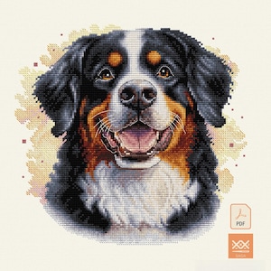 Puede incluir: Patrón de punto de cruz de un perro de montaña bernés con una expresión feliz. El perro tiene pelaje negro, blanco y marrón, con la lengua rosa visible. El fondo es amarillo claro con detalles en rojo. Incluye un icono PDF y la palabra "SAGA".