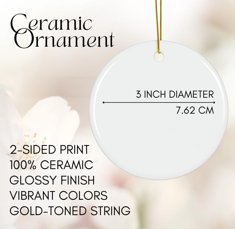 May include: A white ceramic ornament with a glossy finish and gold-toned string. The ornament is 3 inches in diameter (7.62 cm) and features a 2-sided print with vibrant colors.