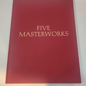 May include: A red hardcover book with the title "FIVE MASTERWORKS" in gold lettering. The book is closed and appears to be in good condition. The cover is a solid, deep red color.