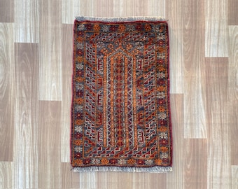 Majestic Hand-Knotted Rug with Intricate Tribal Patterns
