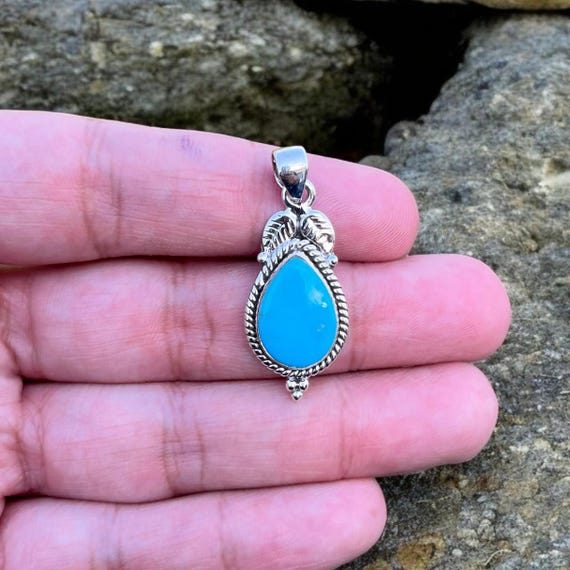 Handmade Turquoise Sterling Silver Pendant: Spiritual Gemstone