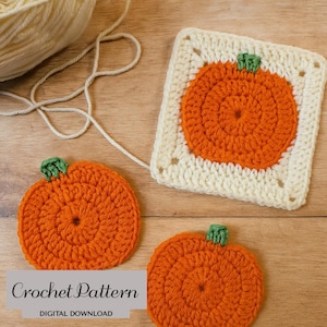 May include: Crochet pattern featuring orange pumpkin designs with green stems. One pumpkin is square, and two are round. The text "Crochet Pattern DIGITAL DOWNLOAD" is visible. The pumpkins are set on a wooden surface with cream-colored yarn.