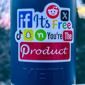 May include: A blue Yeti water bottle with various social media logos and the text "if it's free you're the product" on a sticker.