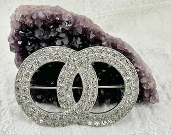 Broche Art Déco vintage con doble círculo de diamantes de imitación (década de 1940)
