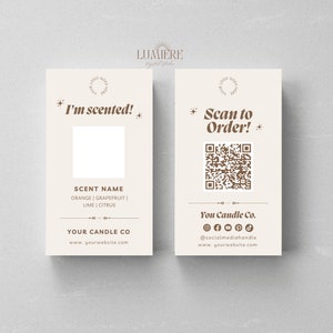 May include: A cream-colored card with a brown border and text that says "I'm scented!" and "SCENT NAME" with a list of scents: Orange, Grapefruit, Lime, Citrus. The card also has the text "YOUR CANDLE CO" and "www.yourwebsite.com". On the right side of the card is a QR code with the text "Scan to Order!" and "You Candle Co." with social media icons and a website address.
