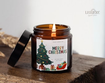 May include: A lit soy wax candle in a brown glass jar with a black lid. The label reads "MERRY CHRISTMAS" with a Christmas tree and presents. The candle is 8 oz (227g).