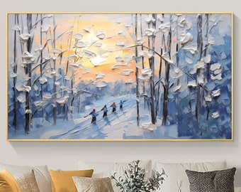 May include: A painting of a snowy forest scene with a group of people cross-country skiing. The sky is a vibrant orange and yellow, and the trees are covered in white snow. The painting is framed in gold.