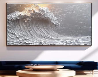 May include: A large, abstract painting of a white wave crashing against a gray background. The wave is textured and appears to be three-dimensional. The painting is framed in a thin, wooden frame.