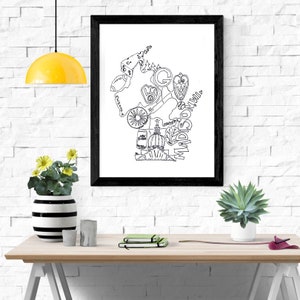 May include: Black framed art print featuring a black and white outline of the state of Wisconsin, filled with illustrations and the word "Madison". The artwork is displayed on a white brick wall.