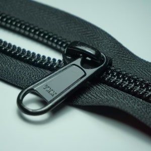 YKK Long Pull Continuous Zipper Tape and Pulls/Sliders. Size #5 RC Nylon Coil/Polyester Chain BLACK 580 Zip