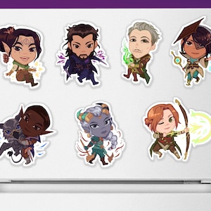 May include: Set of 8 chibi-style character stickers featuring a variety of fantasy characters, including a human with a sword, a human with a staff, a human with a bow and arrow, a human with a book, a human with a dagger, a human with a staff, a human with a staff, and a human with a staff. The stickers are printed on white paper with a glossy finish.
