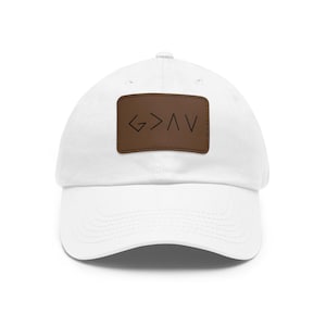 God is greater than the highs and lows - Dad Hat with Leather Patch (Rectangle)