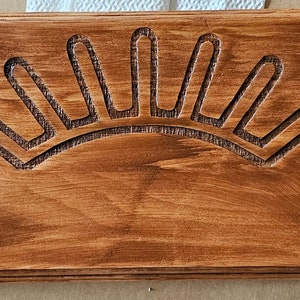 Finished plaque with stain