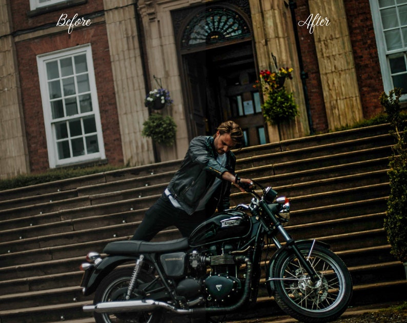 May include: A man wearing a black leather jacket sits on a black motorcycle in front of a brick building. The motorcycle has a chrome exhaust pipe and a black seat.
