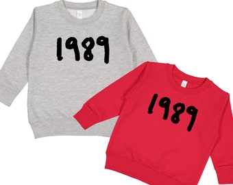 1989 Taylor's Version Crewneck Pullover Sweatshirt, 1989 Blue Era Fleece Sweater for Toddlers, Youth or Adult, 1989 Taylor Swift Sweatshirt