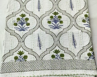 May include: White kantha quilt with a green and blue floral pattern. The quilt has a geometric design with a border of green stripes.