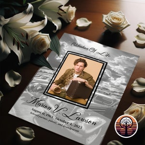 May include: A black and white photo of a man in a black framed photo on a silver background with clouds and a car in the background. The text "Celebration of Life" is at the top of the page and the text "Marion V. Lawson August 11, 1963 - October 4, 2023 Beloved partner, parent, and grandparent" is at the bottom of the page.