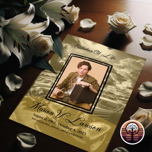 May include: A gold and black memorial card with a photo of a man in a brown jacket and a suitcase. The text on the card reads "Celebration of Life", "Marion V. Lawson", "August 11, 1963 - October 4, 2023", and "Beloved partner, parent, and grandparent".