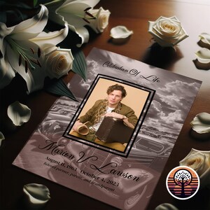 May include: A brown and white memorial card with a photo of a man in a brown shirt and a suitcase. The card has the text "Celebration of Life" and "Marion V. Lawson" with dates of birth and death. The card also has a small image of a tree with a sunset in the background.