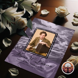 May include: A purple and white memorial card with a photo of a man in a brown shirt and a suitcase. The text reads "Celebration of Life" and "Marion V. Lawson August 11, 1963 October 4, 2023 Beloved partner, parent, and grandparent".