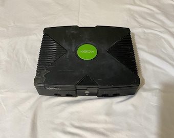 Reparación de piezas de la consola original Microsoft Xbox negra. Sistema de juegos retro vintage.
