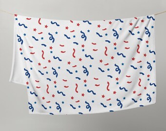 Coperta accogliente rossa, bianca e blu