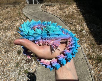Juguete Fidget Fin Dragon - Dragón articulado