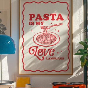May include: A red and white poster with the text "PASTA IS MY LOVE LANGUAGE" and a drawing of a plate of spaghetti with a fork.