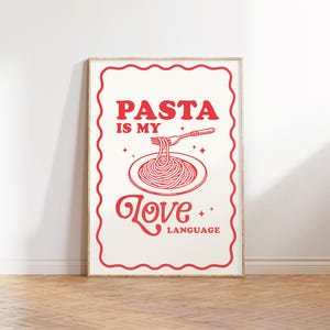 May include: A white poster with red text and a red illustration of a plate of spaghetti with a fork. The text reads "PASTA IS MY LOVE LANGUAGE".