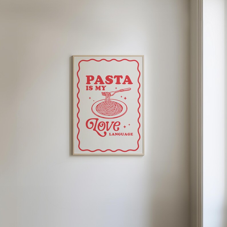 May include: A white poster with a red border and red text that says "Pasta is my love language" with a drawing of a plate of spaghetti and a fork.