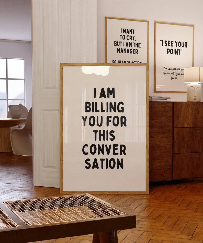 May include: Three framed prints with white backgrounds and black text. The top left print reads "I want to cry, but I am the manager so plan of action." The top right print reads "I see your point." The bottom print reads "I am billing you for this conversation."
