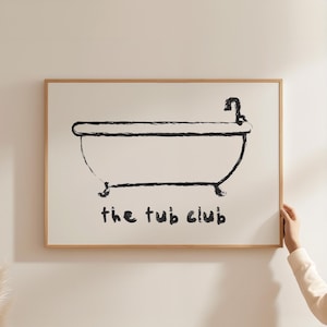 May include: A black and white illustration of a bathtub with the text "the tub club" underneath.