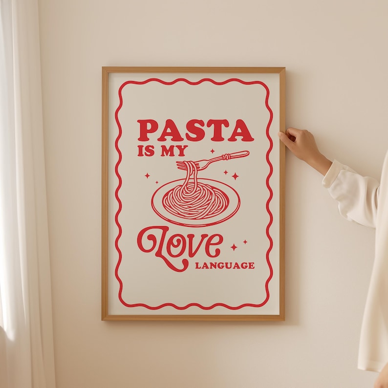 May include: A white poster with a red border and red text that says "PASTA IS MY LOVE LANGUAGE". The poster features a red illustration of a plate of spaghetti with a fork.