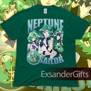 May include: A dark green t-shirt featuring the words "NEPTUNE SAILOR" in a light blue font, along with multiple illustrations of a character with green hair and a white and blue outfit. The text "ExsanderGifts" is at the bottom.