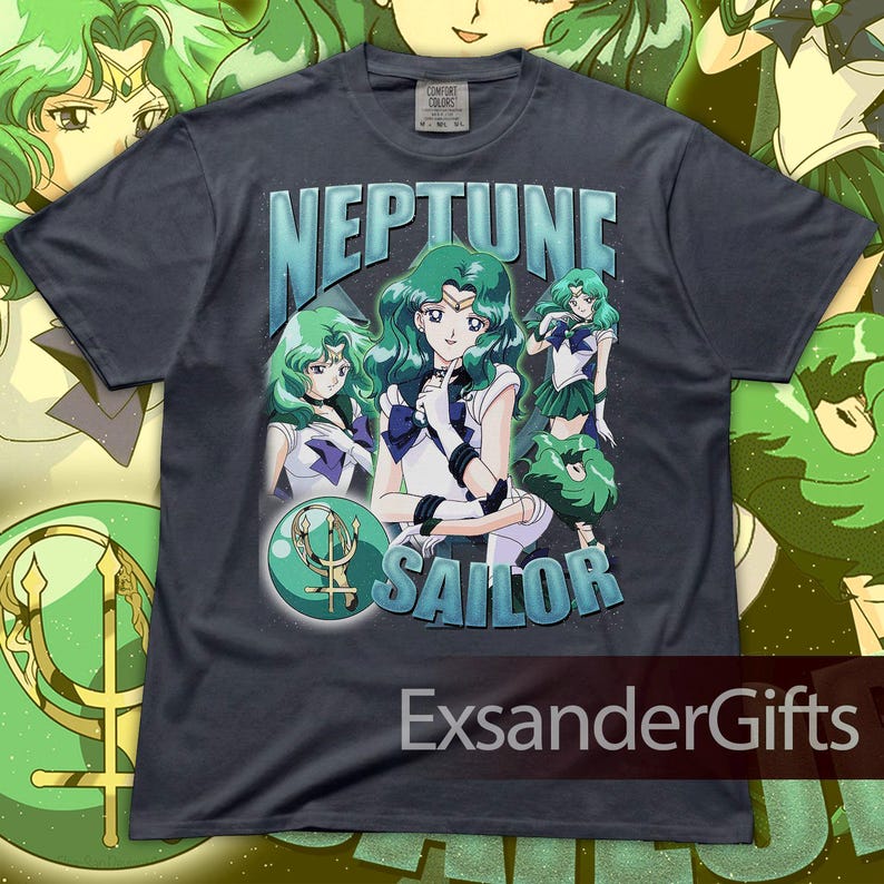 May include: Dark gray t-shirt featuring the words "NEPTUNE SAILOR" with an illustration of a character with green hair and a sailor uniform. The shirt has a vintage, distressed look, with the text and image in shades of blue and green.