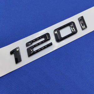 Glossy black 120i logo badge emblem sticker glossy black